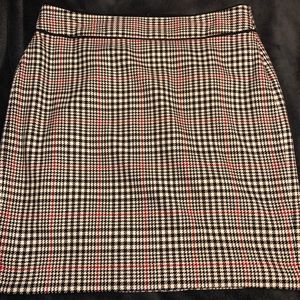 Houndstooth and plaid skirt